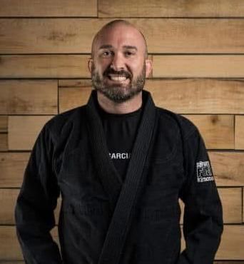 David Brogan — 3rd Degree Black Belt (BJJ), 4th Degree Black Belt (Judo), 1st Degree Black Belt (Tae Kwon Do), Head Instructor in Brazilian Jiu-Jitsu