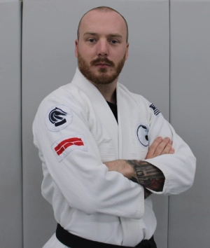 Mr. Cambron — 1st degree black belt, Head Instructor in Brazilian Jiu-Jitsu