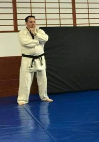 Bill McElhaney — Nidan (Judo 2nd degree black belt) - as listed, Assistant in Brazilian Jiu-Jitsu