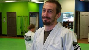 Tyler Smith — Second degree black belt (BJJ); orange belt (Kodokan judo), Head Instructor in Brazilian Jiu-Jitsu