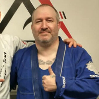 Roger Stiner — Blue Belt (Gracie Jiu Jitsu under Rodrigo Gracie), Head Instructor in Brazilian Jiu-Jitsu