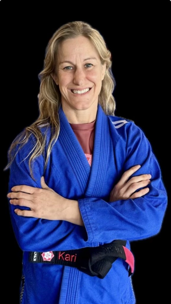 Professor Kari Summers — Master black belt (as indicated on site as Master Blackbelt champion), Head Instructor in Brazilian Jiu-Jitsu
